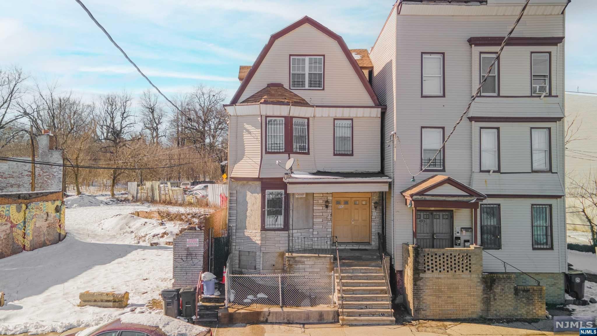 You now have an unbelievable chance to become the owner of this three-unit multi-family property. Spacious bedrooms, large living rooms and a huge partially finished basement with a full bathroom are just a few of the highlights. There is potential for up to $74,000 in yearly rental income after renovations. That is not even considering the HUGE basement with tons of potential for storage. Situated in a prime location, it is minutes from major highways like Garden State Parkway, I-78, Route 22 & I-280. This property is located 10 minutes from Newark Penn Station and Beth Israel Hospital. While also being within 30 minutes from NYC! This property is ideal for both first time homebuyers looking to have tenants pay their mortgage and seasoned investors looking for a great return on investment. Sold strictly AS-IS. This multi-family qualifies for NJ's $22,000 down payment assistance and No Money Down mortgage programs.