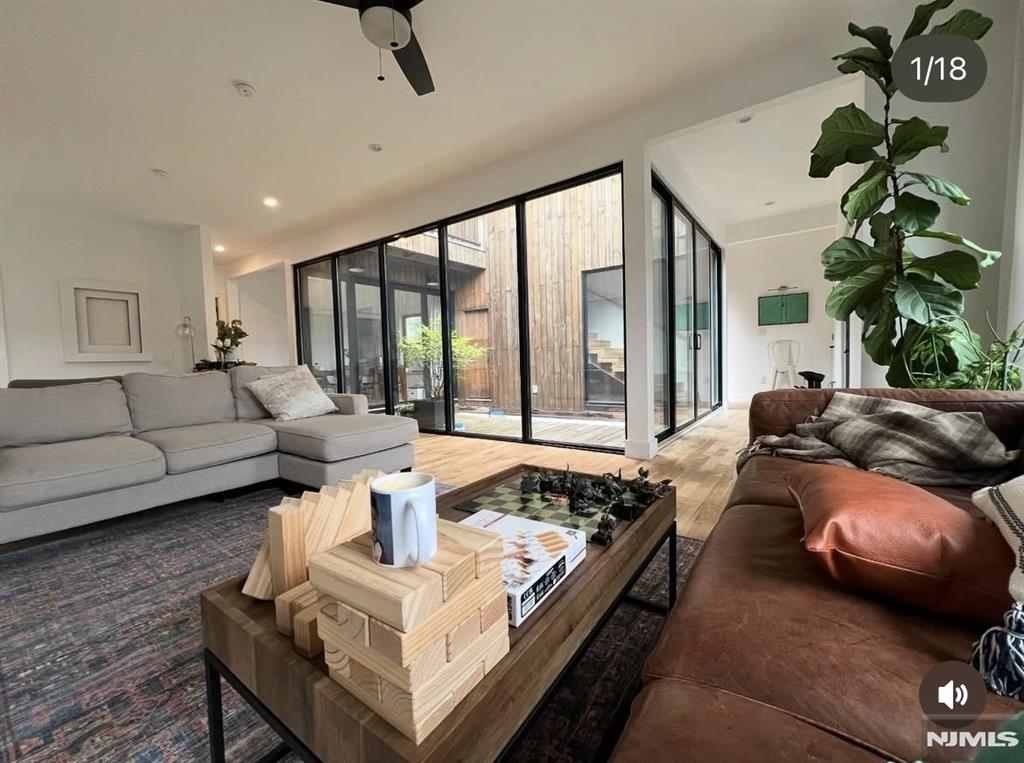 Modern design meets everyday functionality in this expanded 4-bedroom, 3.5-bath home located within a highly sought-after, award-winning school district, top-rated elementary, middle, and high school. At the heart of the home is a beautifully designed inner courtyard, seamlessly connecting and pouring in natural light and creating a unique indoor-outdoor living experience rarely found in Bergen County. The modern eat in kitchen, hardwood floors throughout, and thoughtful layout offer both comfort and style. Dual front and rear entrances provide flexibility for todayâ€™s lifestyle, ideal for work-from-home professionals, extended living, or private access. Enjoy your own inner courtyard and vegetable gardening, outdoor dining, and quiet retreat, plus a rooftop terrace perfect for entertaining. Seasonal dip pool and cedar dry sauna elevates this one of a kind lifestyle. A large garage offers ample storage in addition to an attic play room. 5 minute walking distance to middle school, park and restaurants. More than just a home, this is a lifestyle opportunity in one of Bergen Countyâ€™s most desirable communities.