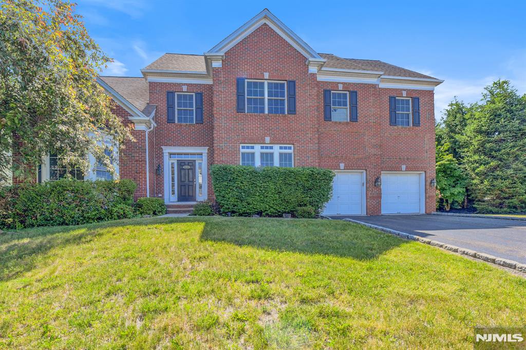This colonial style home offers the perfect blend of space and comfort. The spacious layout offers generously sized living and entertaining areas. The first floor features an inviting entry foyer, living room, dining room, butlerâ€™s pantry, and kitchen with an open layout and sunlit breakfast area. Additional spaces include a family room, bright sitting room with walls of windows, a private office, powder room, and access to the laundry room and attached two-car garage. The second floor features the primary suite. The spacious bath offers a double vanity, soaking tub, and separate glass-enclosed shower. Vaulted ceilings and abundant natural light, create a bright and inviting retreat. Three additional bedrooms complete the upper level, including one en-suite bedroom and two connected by a Jack-and-Jill bathroom. The finished basement includes a spacious recreation area, fitness room, billiards space, a guest room, full bath, utility room and storage area. Step outside to the brick patio framed by bamboo, offering a low-maintenance outdoor oasis ideal for morning coffee or quiet evenings outdoors. To help visualize this home's floor plan and to highlight its potential, photos are virtually enhanced and/or virtual furnishings may have been added to the photos found in this listing. The property is being sold 'as-is'. There are not any seller disclosures nor representations. The buyer is responsible for obtaining the CCO, Smoke Cert. and all inspections required to close.