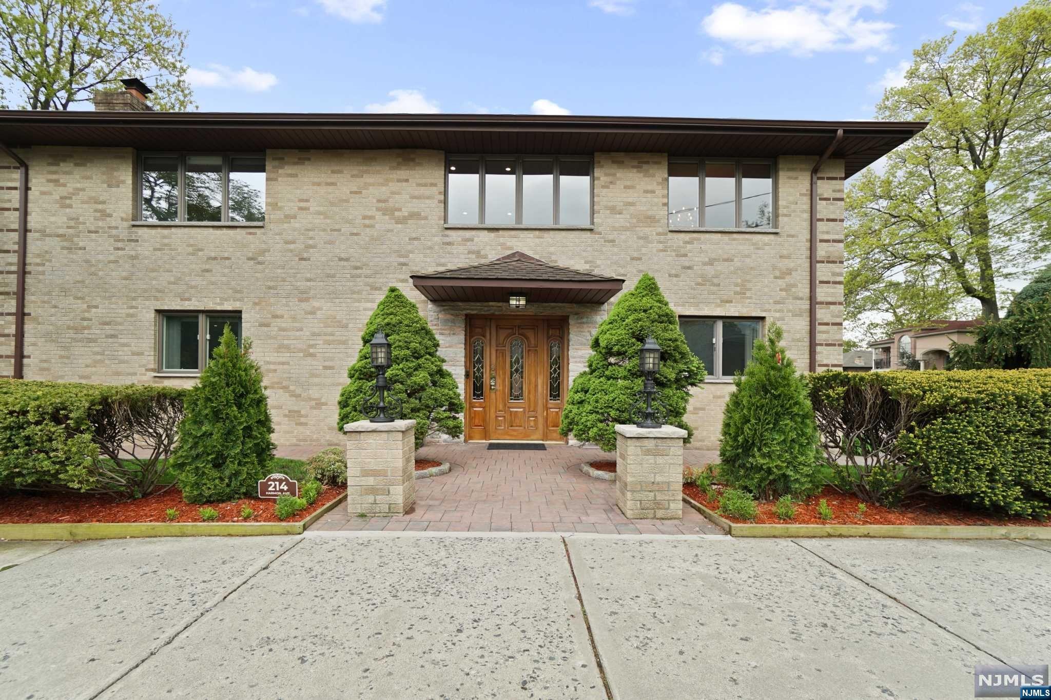 This stunning 3 bedroom, 3 bath home with a private office, located in Fort Lee is a sanctuary of style, comfort and convenience. This home is very well kept, most rooms have been updated within past 5 years. Within minutes of transportation to NYC. Beautiful marbled wood burning fireplace in the family room. Office can be used as a 4th bedroom; possible mother daughter. 2 car garage, private patio backyard, spacious living and dining room, this home truly has all you need! Don't miss your chance to make this beautiful residence your own!