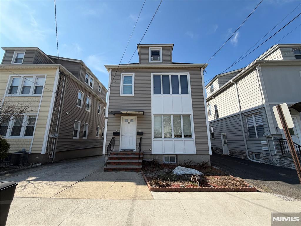 This is your opportunity to own a Two Family house in a desirable location, This income potential, move in ready, recently renovated house includes 2 bedrooms and 1 bathroom, living room with bonus room in each unit. Attic and Basement are fully finished, could be used as recreation room or extra storage. Two detached car garage and driveway for 4 cars.