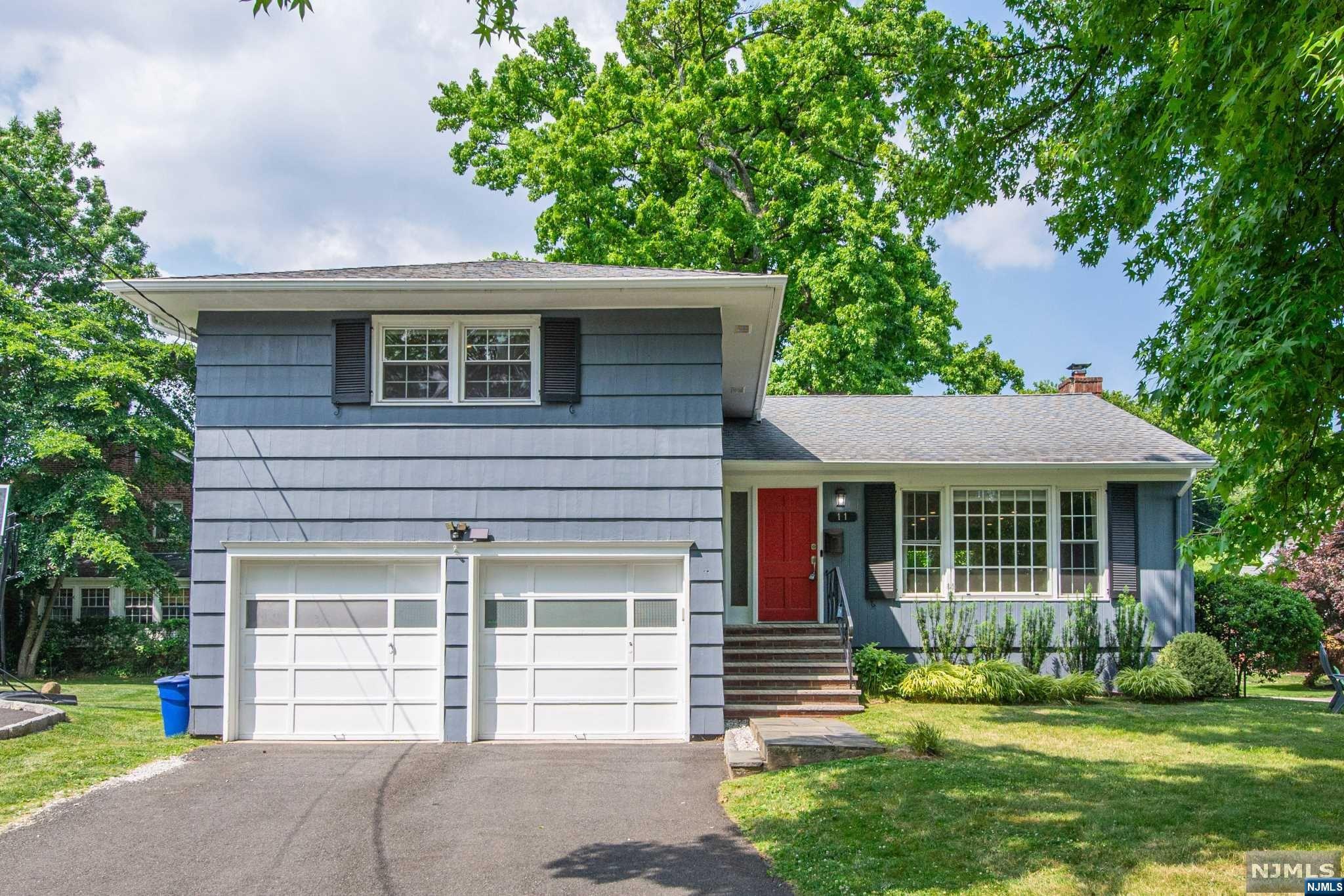 Fabulous updated mid-century open-concept split-level! Around the corner from Maplecrest Park, Maplewood Town Pool & Springfield Ave shops/restaurants, this 3-BR, 2.5 bth home w attached 2-car garage has HW fls, CAC & open living plan. Large living rm w picture window, custom shiplap accented wall, recessed lights, guest closet & ceiling fan. LR opens to formal DR, which opens to gourmet EIK w marble counters, breakfast bar, cust cabs, SS appls & access to backyard deck/patio. Ground level w big fam rm, which can also be an office, a powder rm, laundry rm & door to backyard. Fin basement w rec rm w recessed lights, tile fl, built-in wine bar, closets & storage. 2nd fl w bath w tub/shower, linen & coat closets & 3 generous BRs. Primary BR w ensuite bath w shower, 2 closets w built-ins & ceiling fan. 2nd BR has closet w built-ins & ceiling fan. Backyard w lawn, patio, deck & herb garden. 0.2 mi from jitney to NYC train & bus & near Maplewood Village. Make this wonderful home yours!