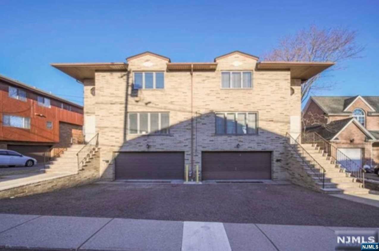 Recently renovated Over sized (75x120) side/side home in a prime location of Fort Lee. Step into the marble step entrance with winding staircase. Brand new modern eat-in kitchens, elegant bathrooms, and hardwood flooring already in place. Location also offers close convenience to NYC transportation, walking distance to school #3,restaurants, shopping, grocery stores, places of worship .Each side has 3Bedrooms and 2.5bathroom ,2car garage with storage room.