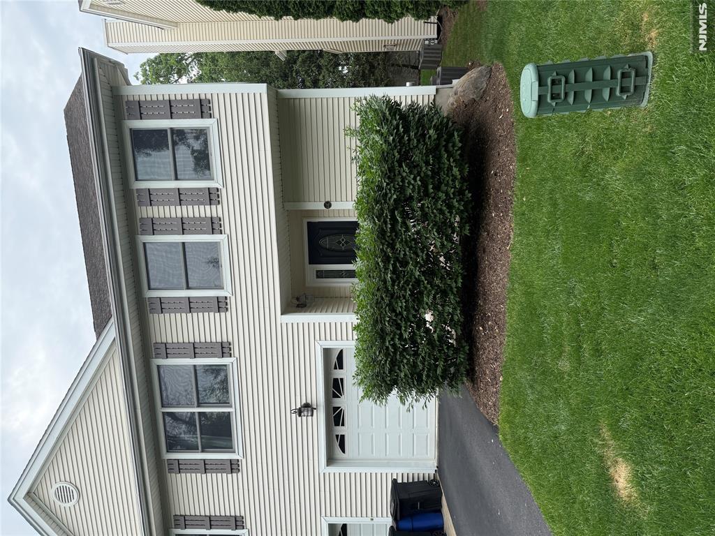 Location, Location! Close to NYC transportation by bus, train, or car; convenient to shopping and restaurants, with Blue Ribbon school district. This townhouse has a wonderful flow for living and entertaining. Living room with fireplace, dining room sliders to deck, plus powder room/laundry. Second floor features primary suite with walk-in closet, bathroom with double sinks, plus two additional bedrooms and full bath. Finished lower level with tons of storage.