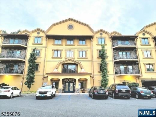 ONE OF A KIND! Exceptional Over Sized LUXURY RENTAL In Active Adult 55+ Age Restricted building in serene location! Enjoy Open Floor Plan of 1,370 sq. ft of one floor living in 5-year young elevator building. Gourmet kitchen with breakfast bar. Granite counters & stainless-steel appliances SPA-LIKE MASTER BATH w/ Jacuzzi tub & walk in tile stall shower. 2 nd full bath has tile stall shower. Gas fireplace in living room, Terrace off living room to enjoy morning coffee or nightcap. WIK, large laundry rm with full size washer & dryer, & storage cabinet. Nice GYM on 2nd floor, residents lounge off lobby 24/7 for games, chatting, WIFI. Outdoor Patio w/ BBG & gazebo. Lobby entrance to covered garage assigned parking space. Secure mail area and keypads at all doors. Temperature controlled carpeted private storage room on each floor. Cat friendly. NO DOGS.