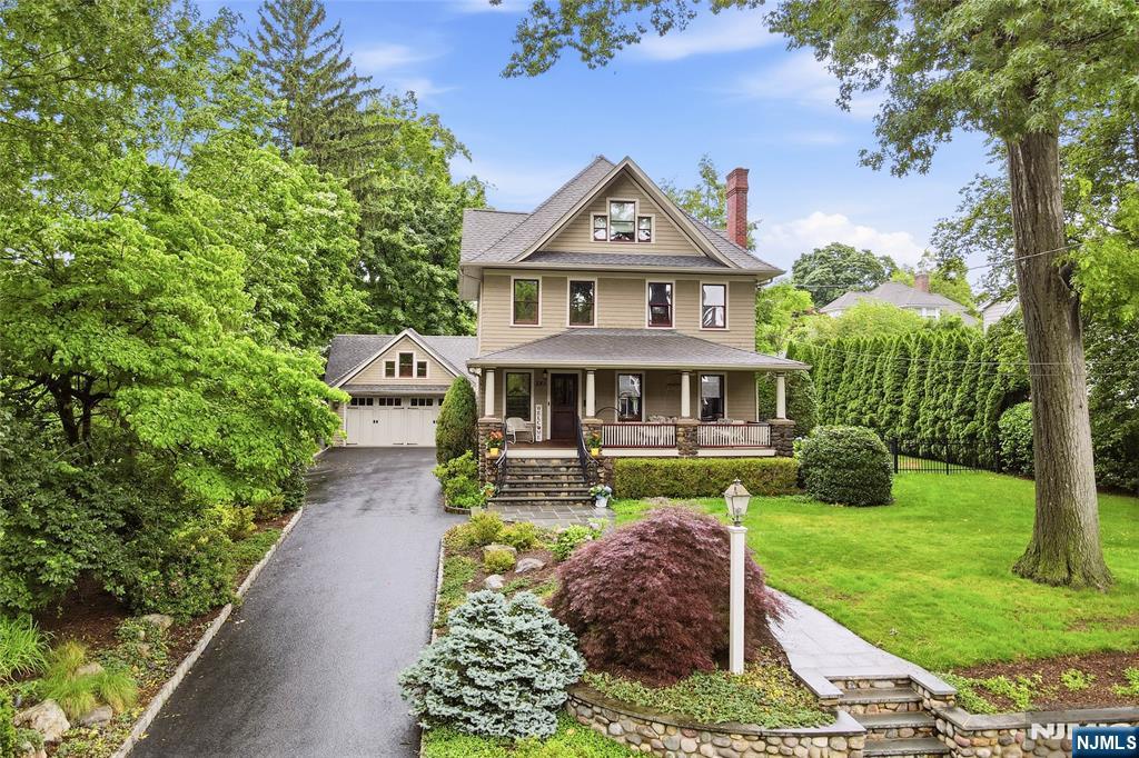 Nestled in Ridgewood's highly sought-after Orchard School neighborhood, this treasured home has been lovingly cared for & enhanced by the same owners for more than two decades. 283 Highwood Ave is a beautifully restored 5 Br, 3.5 bath home offering over 2,500 square feet of timeless charm. Thoughtfully preserved original character with improvements consistent with the home's heritage, creating a warm, inviting residence. The renovated kitchen is designed for both everyday living & entertaining, boasting high-end appliances, custom cabinetry, and premium countertops. The primary bedoom is a private retreat complete with en-suite bath, cathedral ceilings, walk-in closets and skylights thoughout. The finished lower level offers an inviting media area with surround sound as well as versatile space for a recreation room or gym. The magnificent property seamlessly blends classic historical character with today's conveniences. Enjoy the beautifully manicured property with a surprisingly private front porch or the expansive back patio for entertaining family & friends. Walking distance to top-rated schools, downtown restaurants, shopping, and NJ Transit buses and trains to NYC. This special home offers a rare combination of character, comfort and timeless appeal. The perfect place to create lasting memories, a residence that any buyer would be proud to call their own.
