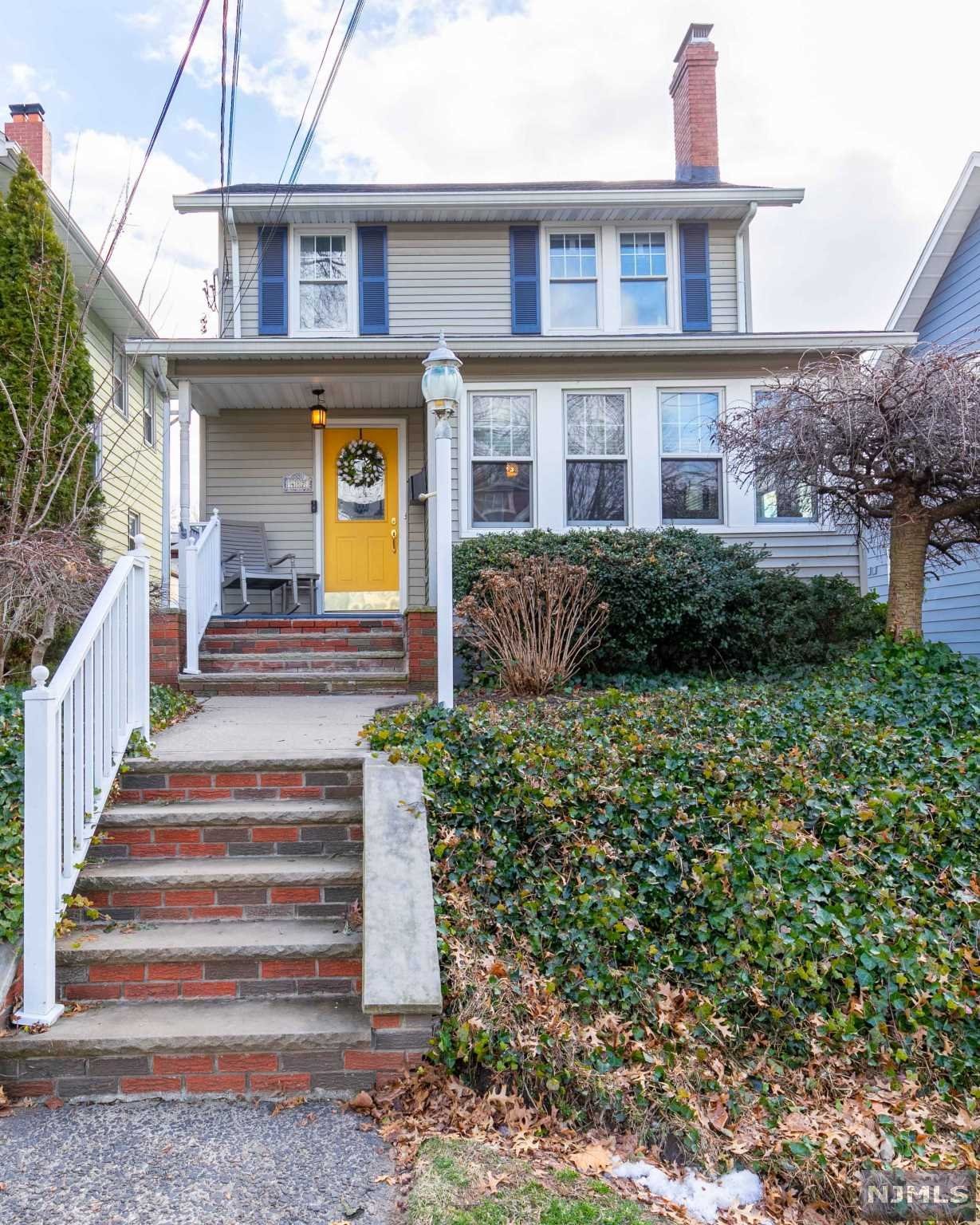 Welcome home! This pretty Colonial situated in a desirable neighborhood of Rutherford offers 3 bedrooms, 2 1/2 baths with finished attic and finished basement. Natural sunlight and hardwood flooring throughout. Newly renovated kitchen provides an open layout eat-in-kitchen and dining room - an entertainer's delight! Features include a large quartz island with breakfast bar, marble backsplash, porcelain tile flooring with radiant heat, skylights, stainless steel appliances, and beverage fridge. Cozy living room with wood-burning fireplace. Window-filled den perfect for additional living space or home office. Laundry and full bath conveniently located on the first floor. Fenced in backyard with paver patio, great for hosting. One car detached garage with driveway for three cars. 2 Blocks to NYC 199 Bus and short walk to Lyndhurst train station. New roof and hot water heater, 200 amp electrical. It's a must see! Note: Seller is a licensed real estate agent