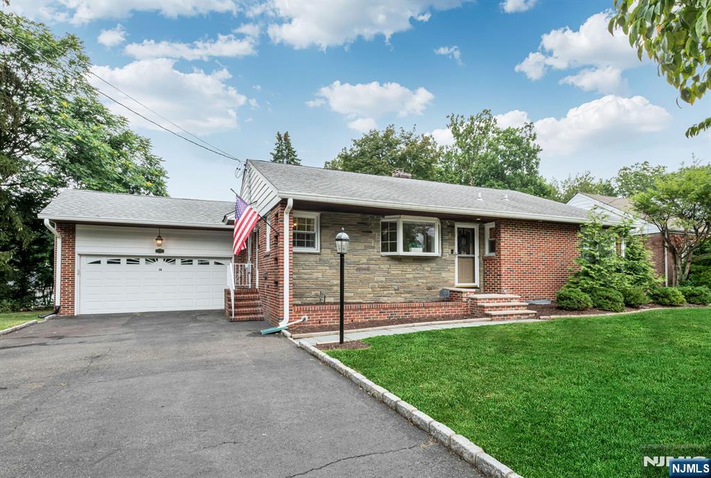 Welcome home to this charming 3-bedroom, 2 full bath ranch nestled on one of Little Falls' most desirable streets. Offering the ease of one-floor living with plenty of additional space, this brick front, well-maintained home features beautiful hardwood floors that add warmth and character throughout. The inviting Living Room is highlighted by a classic wood-burning fireplace, creating the perfect setting for relaxing evenings. The spacious Eat-in-Kitchen provides ample room for everyday meals and entertaining. Just off the airy Family Room, step outside to a beautiful paver patio ideal for summer barbecues, morning coffee, or simply enjoying the private backyard. The finished Basement with full bath expands your living space with endless additional possibilities for a recreation room, home office, gym, or guest area, while the walk-out access to the attached two-car garage and yard adds everyday convenience. With naturally bright living areas, timeless features, and a fantastic location close to Routes 46, 23, 80 and the GSP; Midtown-Direct Train/NJT Bus; Montclair State University and Upper Montclair and Little Falls shopping and restaurants, this home offers the perfect combination of comfort, functionality, and convenience all on one floor. Don't miss this wonderful opportunity to own a move-in ready ranch in one of Little Falls' most sought-after neighborhoods! H&B offers due Wed, 7-15-26 @ 10am