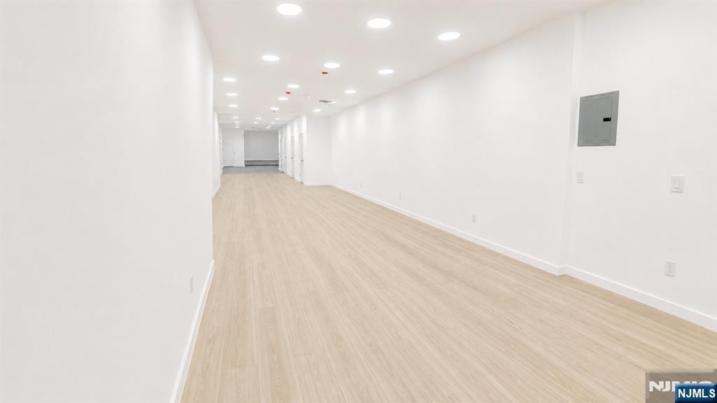 Approx. 1,800 SF retail/commercial space available in the heart of Journal Square with approximately 17 ft of frontage and strong visibility along Newark Ave. Ideal for restaurant, cafe, retail, medical, office, wellness, boutique fitness, gallery, and other approved commercial uses. Recently renovated interior featuring updated HVAC, new water heater, modern lighting, open layout, private rear area, and upgraded storefront presence. Existing commercial utility infrastructure onsite including gas service, plumbing rough-ins/drainage components, and commercial-grade electrical service. Light vinyl plank flooring to be installed prior to lease commencement, with final selection to accommodate incoming tenant use where applicable. Strong pedestrian and vehicle exposure surrounded by dense residential development, established local businesses, and convenient access to Journal Square PATH and major transportation routes. Asking rent: $55/SF NNN with estimated taxes and insurance currently approximated at an additional $5/SF. Tenant responsible for independently verifying intended use requirements and utility capacity.