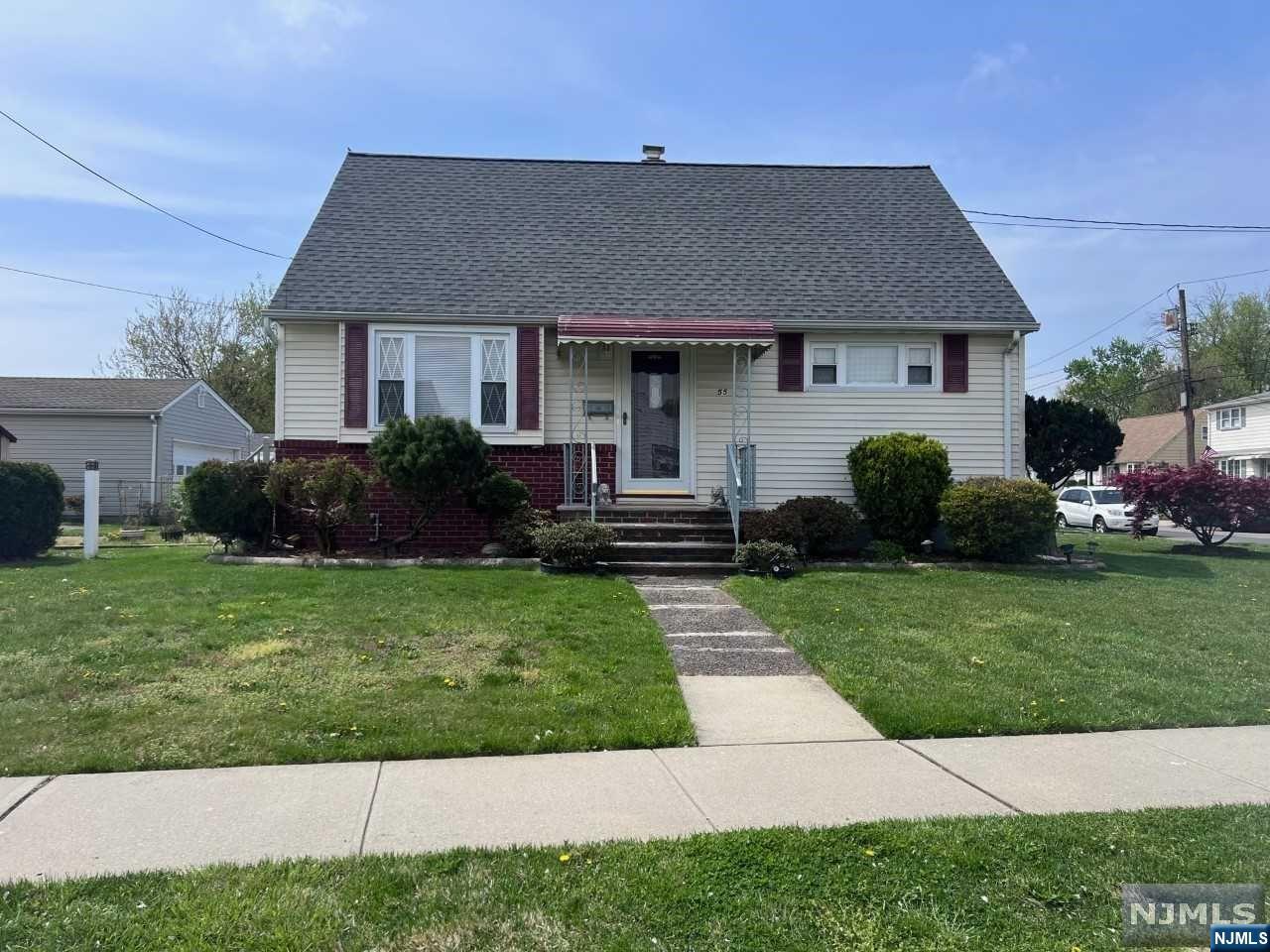 Beautifully maintained corner cape cod house with 3 bedrooms, 2 bathrooms. Hardwood floors throughout. Home is well maintained and ready for new owner. Don't miss this opportunity to own this home!!!