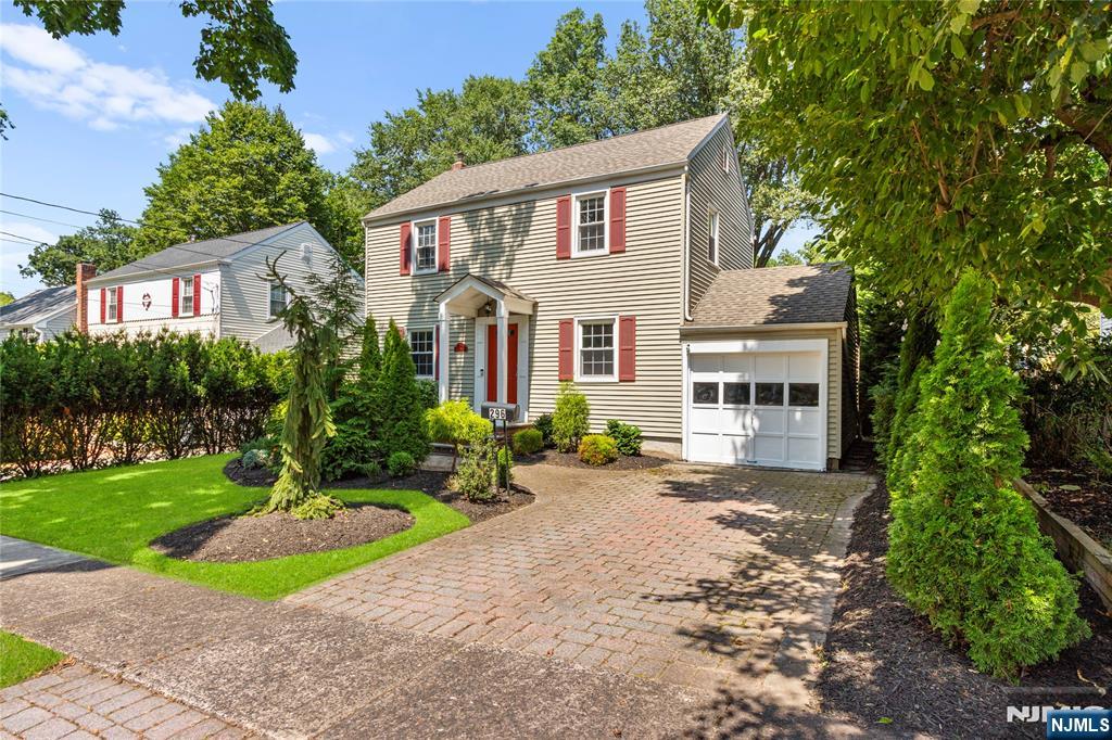 Welcome to this charming, updated Colonial in one of the most sought-after towns, River Edge! Beautifully maintained and thoughtfully expanded, this home blends timeless style with modern comfort. A classic layout greets you with a formal living room and dining room flanking the foyer, perfect for everyday living and special gatherings. Continue into the inviting family room and expansive open kitchen, where a stunning quartz center island, cozy breakfast nook, and abundant white cabinetry create a warm and inviting space. Sliding glass doors lead to the deck and private backyard, while a full bath just off the kitchen adds convenience. Upstairs, youâ€™ll find three bedrooms and a newer full bath. The finished basement offers a spacious entertainment area, multiple storage closets, laundry, and new carpeting. Outdoors, the generous deck is perfect for entertaining or quiet relaxation, overlooking a backyard framed by mature arborvitae for exceptional privacy. Additional highlights include hardwood floors, a new water heater, central HVAC, paver driveway, and a newer roof. Ideally located in the heart of River Edge, this home is within close proximity of top-rated schools, parks, and easy NYC transportation. Welcome to a community youâ€™ll be proud to call home.