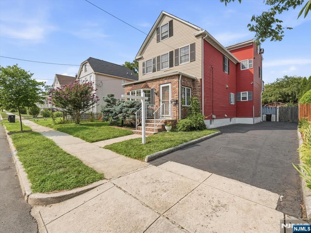 Set in the heart of Maywood, this oversized Colonial delivers timeless character, modern comfort, and exceptional space in one of Bergen Countyâ€™s most desirable communities. With central air and three levels of living, the home offers room to gather, work, entertain and relax. The first floor opens to a sun-filled, wood-paneled living room, a dining room spacious enough to host a table for 12, an updated kitchen, and an expansive family room with a vaulted ceiling and wood burning stove that spans the width of the home. From there, step directly onto the deck and enjoy the backyard retreat, complete with a jacuzzi. Mahogany hardwood flooring shines throughout the first floor. Upstairs are four bedrooms including a massive primary suite featuring an en-suite bath and a private balcony overlooking the backyard, and a 4th bedroom perfectly sized for a home office. A full bath completes the living area. A finished attic adds even more living space, ideal for a home office, crafts room, fitness area, or guest retreat. Minutes from major highways, NYC transportation, top-rated schools, shopping, dining, and parks, this home offers everyday conveniences that suit todayâ€™s lifestyles. Homes with this much space, versatility, and location are a rare opportunity and a true find.