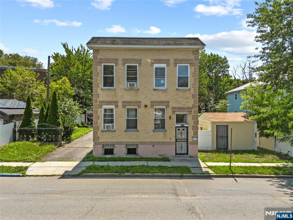 Excellent investment opportunity in the heart of East Orange! This legal two-family home offers exceptional income potential and flexibility for both investors and owner-occupants. Each apartment provides comfortable living space, while the walk-out basement offers additional storage or potential uses. One of the property's standout features is the oversized parking area with space for 15+ vehicles, a rare find in the area and a tremendous convenience for tenants and guests. Ideally located near major highways, public transportation, shopping, schools, parks, and restaurants, this property provides easy access for commuters traveling to Newark, New York City, and surrounding areas.