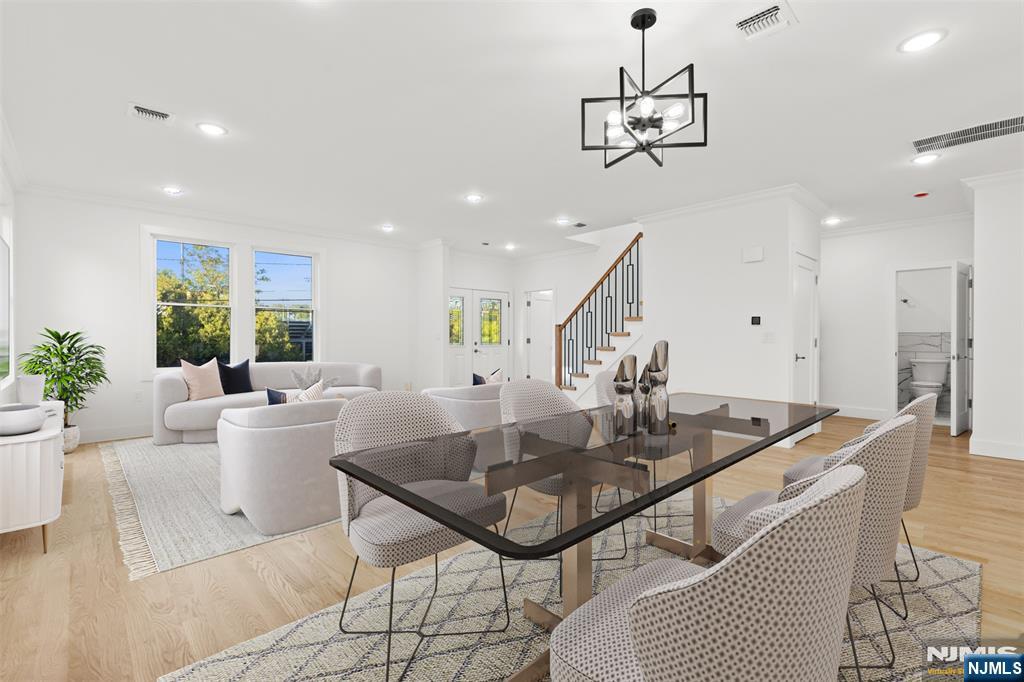 PRICE IMPROVEMENT â€“ Luxury Park-Front Living in Rutherford! Now offered at an exceptional new price, this beautifully rebuilt 5-bedroom, 4-bath home offers approximately 2,700 sq. ft. of finished living space plus additional lower-level and attic space, with over 4,000 sq. ft. of total space. Perfectly positioned directly across from Memorial Park, this stunning home features an open-concept layout, designer kitchen, spacious bedrooms, high-end finishes, 3-zone HVAC, and a covered patio ideal for outdoor enjoyment. The flexible lower level provides space for a home gym, storage, or personal use, while the pull-down attic offers additional storage potential. Located in Rutherford with award-winning schools, vibrant downtown, NJ Transit, restaurants, shopping, and major highways nearby. A rare opportunity to own a beautifully designed home in one of Rutherfordâ€™s most desirable locations. Schedule your private showing today!