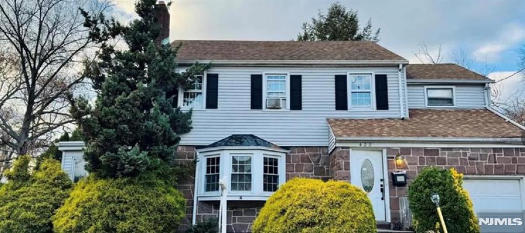 Located in a quiet and tranquil part of Paterson, close to East Side Park Historic District. This charming property sits on a spacious corner lot and offers a flexible layout ideal for a potential mother/daughter setup. It features 4 bedrooms, with 1 conveniently located on the first floor and 3 upstairs. Enjoy its spacious living room with a cozy fireplace, formal dining room, and an updated eat-in kitchen with newer stainless-steel appliances. The fully finished basement includes a private entrance, providing additional space. A stand-up attic offers the opportunity for future finishing, while the attached garage adds convenience and storage. Enjoy outdoor space on both sides of the property, taking full advantage of the desirable corner lot setting. Back on the market, buyer could not obtain mortgage. Call Me to schedule a private showing at 201-774-4420.