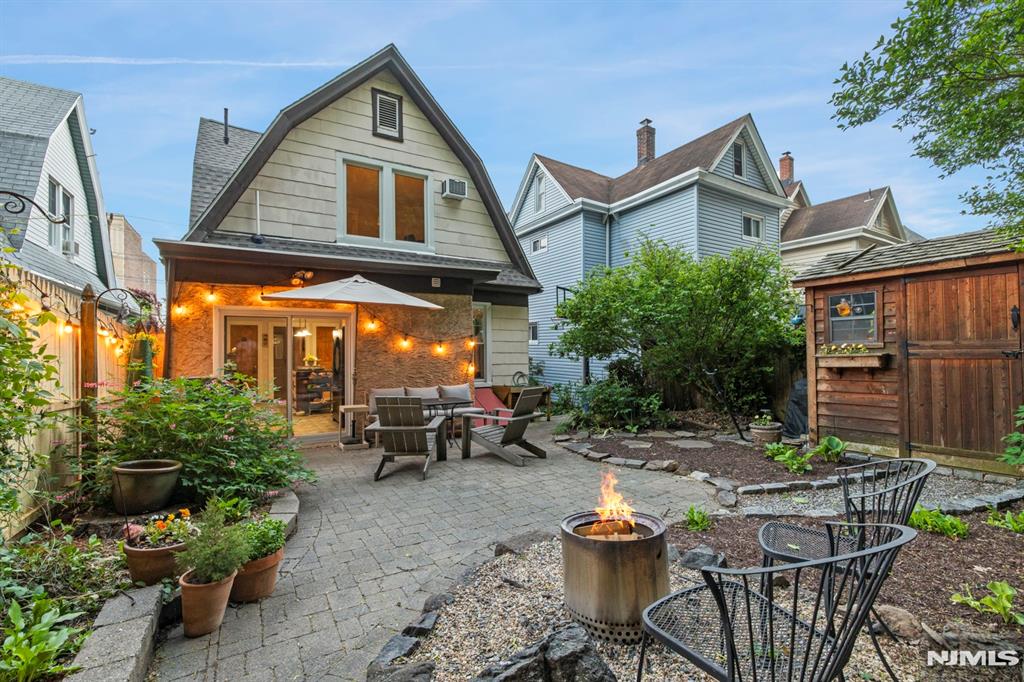 The only 1 family HOUSE under $1 Million in Edgewater for sale. This Edgewater gem awaits the next loving owner: A meticulously maintained 'Dutch Colonel' house lies on a large 30 x 125"ft lot. Many nice surprises await both inside and out; from the original stained-glass windows inside, to the nature embraced setting, outside. A sunny patio, complete with a birdhouse, greets you as you enter into the property. The house has a foyer w/an interior door, formal dining room, MEIK with a center island, a sliding glass door to the back yard, and solid oak HW floors throughout. Everything has been updated, and/or serviced recently, and it has a 1-year-old roof and mini split AC/Heat systems. The full basement has an additional shower and Bilko doors to the back yard. The back patio is great for relaxing, dining, and entertaining. It even comes with a country-like shed and borders the wooded mountainside. The property also has an â€œEco Friendlyâ€ landscaping design with flowers, plantings, and water erosion control, with gravel walkways, along pavers. Located right in the center of town near worship, EVG school, post office, Trader Joes, Whole Foods, and more.