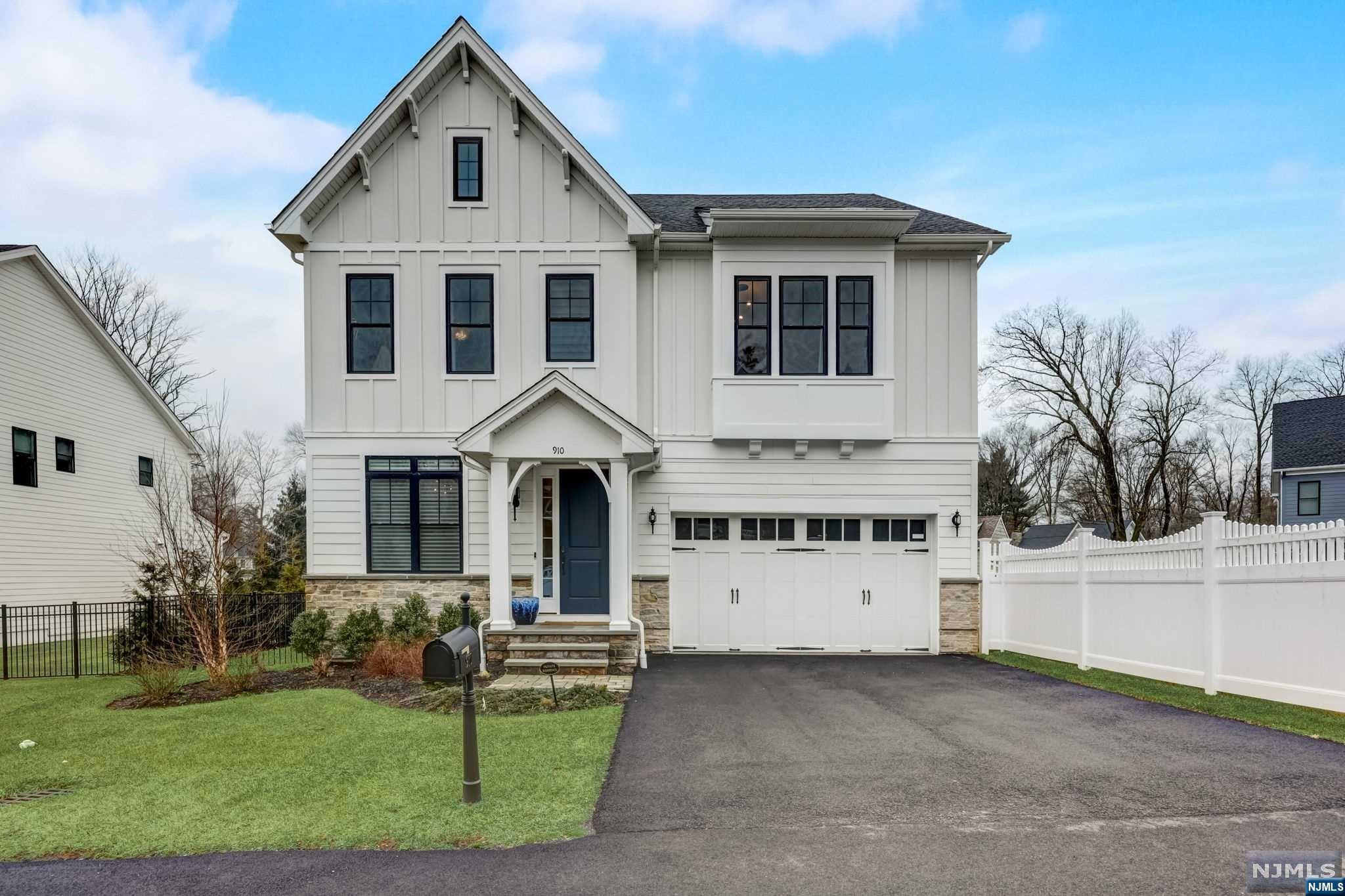 Just 3 yrs young, welcome to one of the most sought after locations in West Saddle Estates. Set back from Hollywood Ave, w a private drive (118') leading to the home, you'll enjoy privacy & space on this oversized lot. Many custom upgrades incl beautiful paneled wall details, wide plank hw flrs & stunning modern, sleek stylistic choices. 10' Ceilings on 1st flr and a beautiful aesthetic throughout! Wonderful flr plan w open concept Din Rm,Grt Rm w wall mounted gas fpl & well designed, high end Kitchen. SS appliances, waterfall edge ctr island, custom bar & walk-in pantry. Adjacent bfast area plus spacious covered outdoor living area, all overlooking private rear yrd. Upstairs, 4 nicely sized BRs incl Primary w tray ceiling, 2 walk in closets & spa-like bth. 2nd floor open "loft" area & laundry rm. Finished lower levl w/ tremendous addt'l space. New heated saltwater pool 18'x38' w sundeck & blu stone surround.Fully fenced-in yrd.Close proximity to NYC transp & schools!