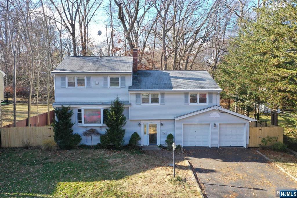 Amazing opportunity to purchase a 5 bedroom, 4 full bath home w/ 3 car garage (2 tandem) in AAA residential neighborhood. This spacious split level needs someone to restore it to glory, as the home needs interior renovation. The ground level boasts an entry foyer w/ coat closet, family room, full bathroom and a spacious sunroom with door leading to the fully fenced in back yard. The first floor features formal living & dining rooms along with kitchen that features an expanded eat-in dining area with palladium window. The 2nd floor consists of the primary suite w/ full bath (gutted), bedrooms number 2 & 3 and an additional full bath. The 3rd floor consists of two more bedrooms and the 4th full bath of the home. Full of potential for construction orientated buyer or investor. Estate being sold "as-is" and seller would prefer buyer to obtain CCO.