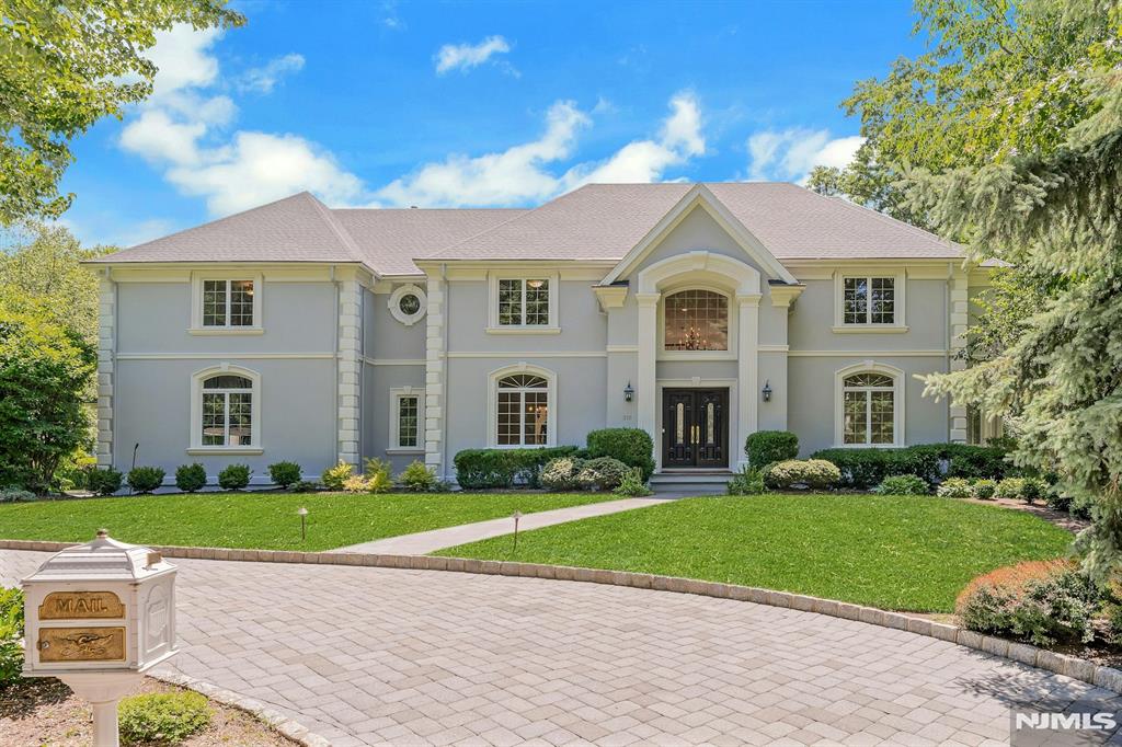 Nestled on a cul de sac on a 1.1+ acre lot in prestigious Franklin Lakes, NJ, is a masterfully custom-built home offering the ultimate luxury, with lush mature landscaping delivering unmatched curb appeal and seclusion. Impeccably maintained with no expense spared, the home features a whole house generator, newer roof and multi-zone central AC. The double door entry reveals a dramatic two-story foyer that opens to sun filled 2 story great room with a gas fireplace and Schoenbeck Chandelier. There are 6 bedrooms and 5 1/2 baths. An elegant living room and banquet sized dining room provide a perfect setting for gatherings. The large, renovated kitchen has lots of prep space for the chef as well as a new tile floor and upscale appliances. A first-floor guest bedroom with a bath completes the first floor. There are two outside entries to a large deck Custom millwork throughout highlights the homeâ€™s craftsmanship. Upstairs, the primary bedroom has walk-in closets, whirlpool tub, separate shower, and private water closet. There are four additional bedrooms with en-suite baths that complete this level beautifully. The massive lower level is a blank canvass where you can create a gym, wine cellar or theater A rare opportunity in Franklin Lakesâ€™ most sought-after neighborhoods. A complete list of updates done in May of 2026 is included on line with the sellers disclosure. Convenient to schools, parks, shops, highways, & the Indian Trail Club