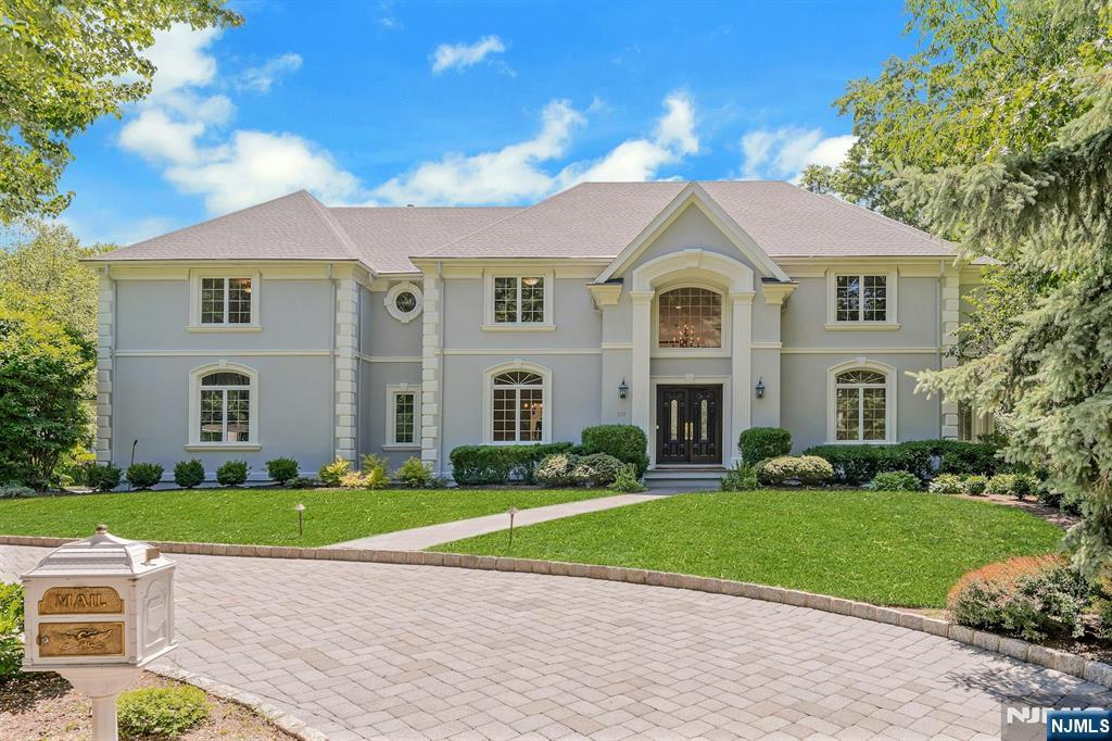 Nestled on a cul de sac on a 1.1+ acre lot in prestigious Franklin Lakes, NJ, is a masterfully custom-built home offering the ultimate luxury, with lush mature landscaping delivering unmatched curb appeal and seclusion. Impeccably maintained with no expense spared, the home features a whole house generator, newer roof and multi-zone central AC. The double door entry reveals a dramatic two-story foyer that opens to sun filled 2 story great room with a gas fireplace and Schoenbeck Chandelier. There are 6 bedrooms and 5 1/2 baths. An elegant living room and banquet sized dining room provide a perfect setting for gatherings. The large, renovated kitchen has lots of prep space for the chef as well as a new tile floor and upscale appliances. A first-floor guest bedroom with a bath completes the first floor. There are two outside entries to a large deck Custom millwork throughout highlights the homeâ€™s craftsmanship. Upstairs, the primary bedroom has walk-in closets, whirlpool tub, separate shower, and private water closet. There are four additional bedrooms with en-suite baths that complete this level beautifully. The massive lower level is a blank canvass where you can create a gym, wine cellar or theater A rare opportunity in Franklin Lakesâ€™ most sought-after neighborhoods. A complete list of updates done in May of 2026 is included on line with the sellers disclosure. Convenient to schools, parks, shops, highways, & the Indian Trail Club