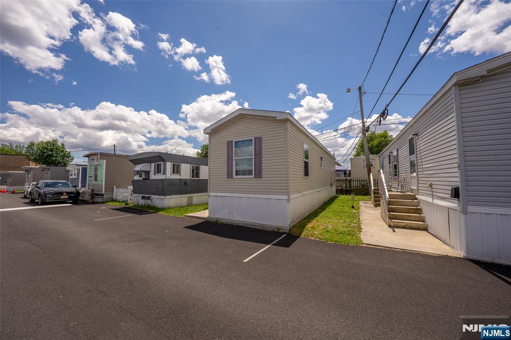 Welcome to this beautifully renovated mobile home, offering a bright and spacious living environment. This property features 2 well-appointed bedrooms, 1 modern bathroom and an abundance of natural light throughout. Enjoy comfortable living in this thoughtfully designed place, perfect for relaxation and living. This is one of the few mobile homes that comes with central air. Great community at a VERY convenient location; Very short minutes away from highways. For example, 95, 80, route 17, 21, 46-E. 10 Minutes away from restaurants and malls such as Garden State Mall Plaza and American Dream Mall! More importantly 10 minutes away from NYC! FINANCING AVAILABLE. Make this home your new home! This place is a great place for first investment. Do not miss out!