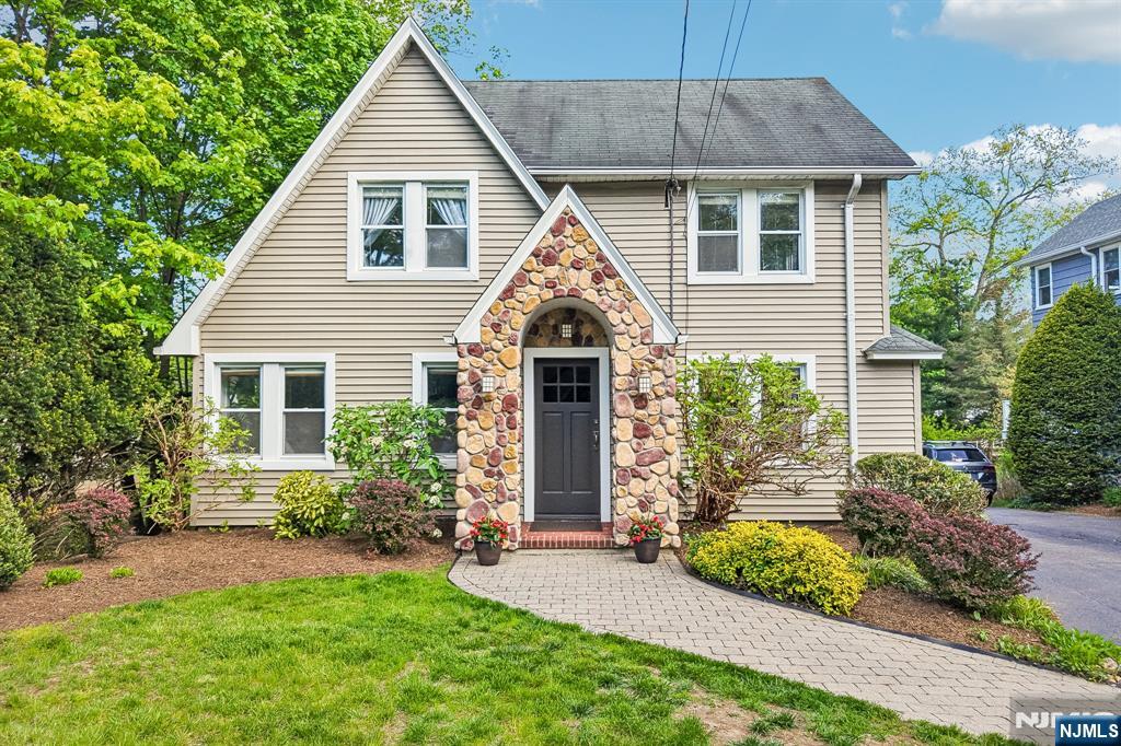 Welcome to this bright and airy Colonial, where timeless character & everyday comfort come together for an unbeatable lifestyle. This 4 bedroom, 2.5 bath home offers a warm & inviting layout, beginning with a gracious living room with fireplace rich in architectural detail & a separate family room designed for relaxed living. The Chefâ€™s kitchen with new 6-burner stove and wall oven, offers easy flow to the dining room & access to the mudroom, convenient 1st floor laundry, bedroom & full bath. The 2nd floor hosts three well-proportioned bedrooms including a large primary bedroom & a junior suite with half bath. The large walk-up attic & full basement provide ample storage and additional space. The private backyard oasis with paver patio is perfect for outdoor dining or a quiet retreat, complete with a two-car garage. Stroll through the Old Country Club neighborhood, Gypsy Pond Park, and close to Orchard school, transportation and downtown Ridgewood