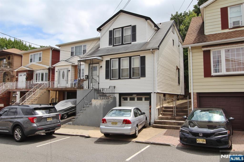 BOM-4-08-26 "AS IS" sale house needs repairs. Nestled in North Bergen with a convenient location near major bus lines and light rail access, this home offers both practicality and potential. The first level welcomes you with a flowing layout that includes a spacious living room, formal dining room, and kitchen. Upstairs, youâ€™ll find three well-proportioned bedrooms and a full bathroom. The basement level adds bonus flexibility with a utility room, laundry area, and direct access to the attached garage. Off-street parking is a true asset here, with both a driveway and garage included. Sitting on a deep 25x100 lot in an R1 zone, this property presents future development possibilities â€” including potential for a two-family home (subject to local approvals). The extended backyard provides ample room for outdoor use or future expansion.This property is being sold strictly "AS IS"- seller will not do work or offer any credits. Buyer responsible for all municipal certificates and interior content removal. Short Sale-subject to third party approval