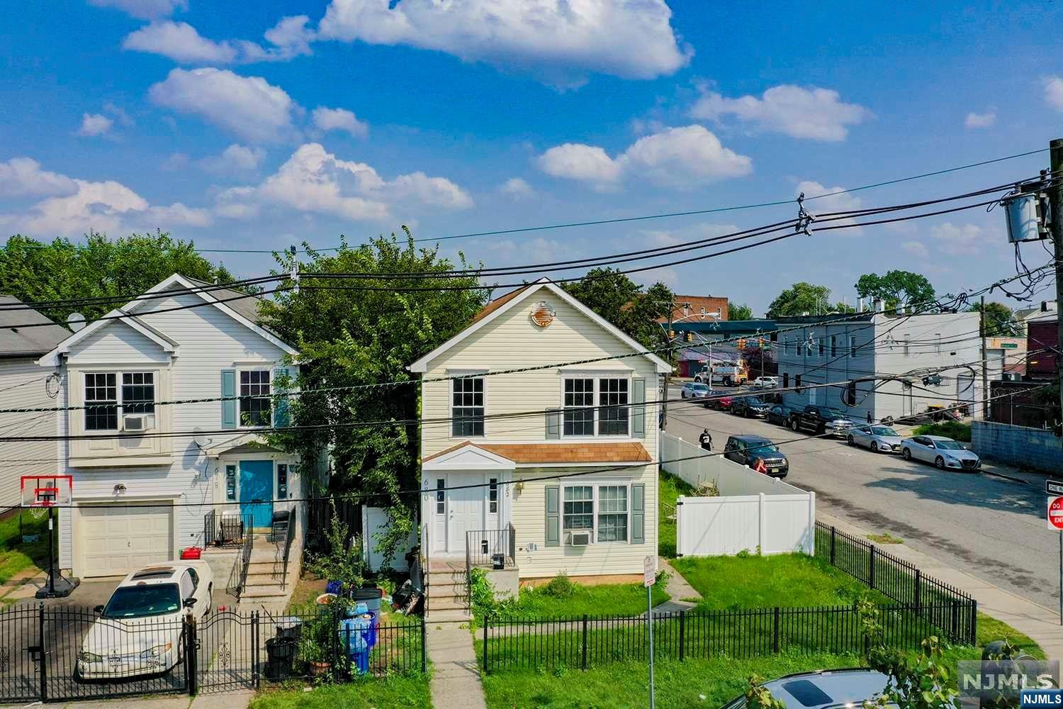 BOM!! Welcome to this spacious, centrally located two family, minutes from downtown Newark. This well kept multi sits on a large corner lot on a quiet street. The property's proximity to all major highways is unmatched. The new owner will enjoy being 4 minutes from GSP, 9 minutes from 280, 78 and Penn Station.