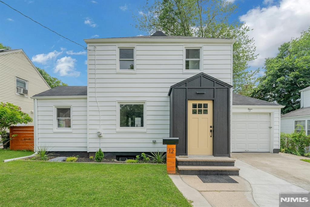 Completely renovated 3-bedroom, 2-bathroom Colonial home in Teaneck. The first floor offers a highly functional layout featuring a living room, formal dining room, and a modern eat-in kitchen equipped with stainless steel appliances. This main level also includes the convenience of a first-floor bedroom and one full bathroom. The second floor provides two additional bedrooms and a second full bathroom. Additional living space is found in the fully finished basement, which includes a dedicated laundry area and utility room. Exterior amenities feature a large backyard deck and an attached garage. The home utilizes a gas hot air heating system. Ideally situated near local parks, schools, shopping centers, and public transportation. All kitchen appliances are included in the sale; furniture is excluded.