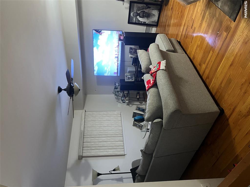 This well-maintained multi-floor condo is located in the desirable Orchard Meadows section of Union Township, NJ, offering a comfortable and functional layout ideal for modern living. Featuring three spacious bedrooms and two and a half bathrooms, the home combines style and practicality throughout. Beautifully kept wooden floors run throughout the home, adding warmth and elegance, while the kitchen and bathrooms are finished with durable tile flooring for easy maintenance. The second floor serves as the main living area, complete with an inviting eat-in kitchen, a bright and open living and dining room combination, a convenient powder room, and a dedicated laundry room equipped with a washer and dryer.Upstairs on the third floor, you'll find three generously sized bedrooms and two full bathrooms, providing ample space for relaxation and privacy. The home is fully air-conditioned for year-round comfort and includes ceiling fans in the living room and two of the bedrooms for added airflow. A standout feature is the private deck located just off the kitchen perfect for enjoying warm days, grilling, or unwinding in the evening after a long day. Additional amenities include a Ring doorbell for enhanced security, a designated parking space, and a full suite of stainless steel appliances, including a stove, refrigerator, and microwave oven and dish washer.