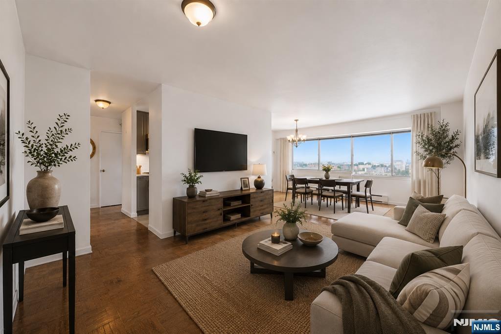 Enjoy 14th-floor living in this spacious 798-square-foot one-bedroom condo featuring an oversized living and dining area, an updated kitchen, and a renovated bathroom. The monthly HOA offers exceptional value, covering heat, hot water, gas, trash removal, and one assigned parking space. Residents also enjoy the convenience of shared laundry within the building.Situated along East Orange's historic Prospect Street corridor, one of the city's most established residential avenues, this home is surrounded by beautiful historic architecture while offering exceptional commuter convenience. Just minutes from I-280, the Garden State Parkway, Route 21, and both the East Orange and Brick Chrch train stations with direct service to Newark and New York City, getting around is effortless.Whether you're purchasing your first home, downsizing, or looking for a smart investment opportunity, this condo offers an ideal combination of space, value, and convenience in a location that keeps you connected to everything Northern New Jersey has to offer.