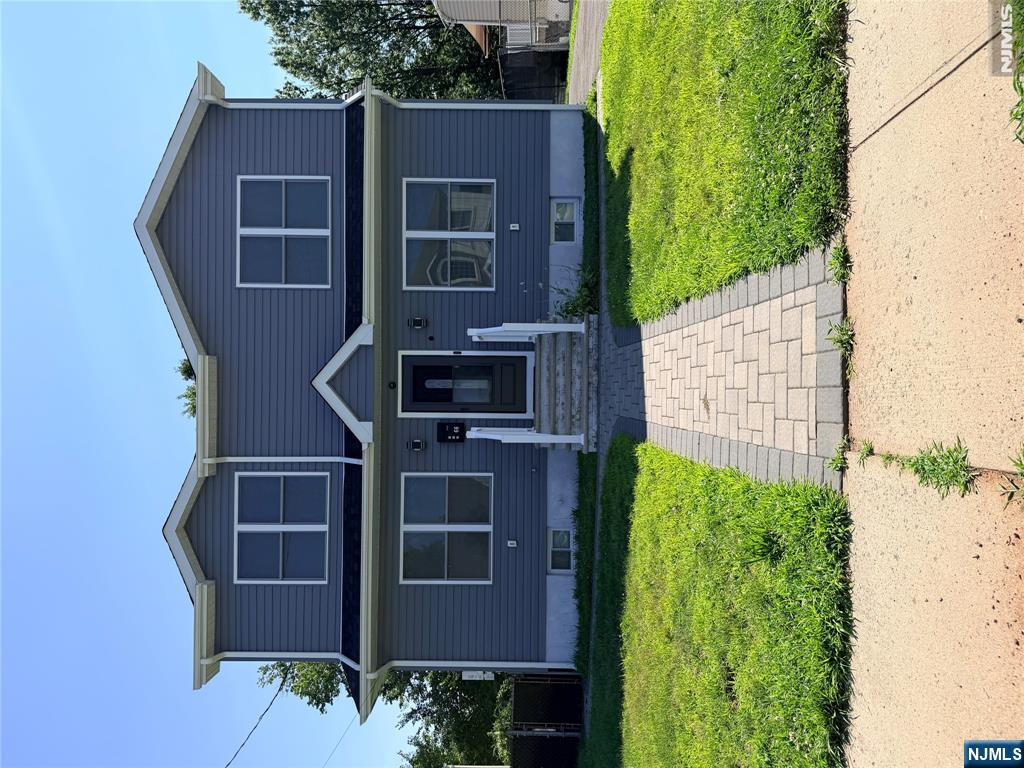 Welcome to this beautifully renovated Colonial, ideally situated on a quiet cul-de-sac in an established residential neighborhood. Renovated in 2023, the home features spacious, light-filled rooms and an open-concept main level with a living room, dining area, and modern kitchen complete with a center island. Sliding doors lead to a covered Trex porch perfect for outdoor dining, relaxing, and entertaining. The impressive primary suite offers high ceilings, an en-suite bath, and a walk-in closet. A finished basement provides approximately 780 additional square feet of flexible living space, along with a laundry room and utility room. Additional highlights include a tankless water heater, 200-amp electrical service, three-zone gas heat, central air conditioning, and a private backyard. Conveniently located for commuters.