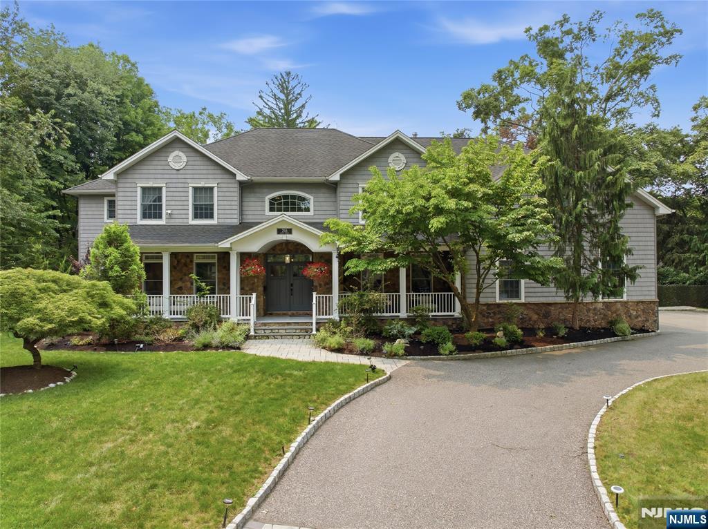 Welcome to this incredible young & exceptional 6 bedroom 5.5 bath Manor Home stately set on a quiet residential street; your own private retreat featuring a stunning fenced in yard including salt water heated in-ground pool with NEW liner, Pool, new system upgrade controlled via OMNI app, & new LED lights inside the pool, paver patio, custom Trex decking, remarkable privacy, & the lifestyle of your dreams..The floor plan offers soaring ceilings & an open floor plan to accommodate both entertaining & a sophisticated lifestyle. The covered front porch is expansive and comforting, a place to relax while watching the world go by. As you enter the 2 Story Grand Entry Foyer, the beauty of the open space is breathtaking. Enjoy a true cooks kitchen with expansive Center Island, Butler's Pantry, Pantry, quartz counters, new Thermador Refrigerator & stainless appliances, which opens to a Breakfast Room & the two story Great Room w/fireplace & views of the incredible rear yard. Main Level Guest Suite/6th Bedroom/Bath, plus a powder Room. The upper Level has 5 additional full Bedrms & 3 Full Baths, including the Romantic Primary Suite w/Bath, 3 walk in closets, & gas fpl. The Basement is another full level of living space, w/bath, recreation room, office, Playroom, extensive storage, & a whole house water filtration system & extensive LED recessed lighting. This home offers exceptional appointments & is just minutes from the Valley Brook Golf Course. Close to NYC Transportation.