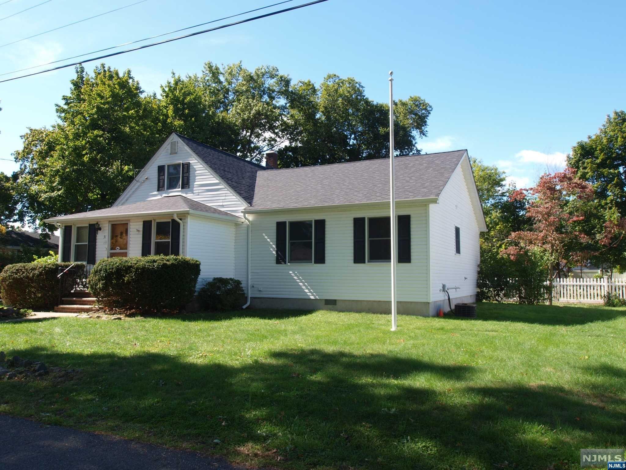 Imagine expanding this Cape Cod even more. Fabulous level 120 x 148 lot. Endless possibilities here. Living Room, Bedroom, Full C/T Bath and Dining Room. Kitchen w/SS gas stove. Built in Buffet gives you added storage. 2005 Family Room addition w/slider to the deck and yard. Convenient laundry and Master Bedroom Suite with Full C/T Bath, handicap accessible. 2nd floor offers another full C/T bath, built in drawers and 2 good size Bedrooms. Full unfinished basement for more storage. Conveniently located in the middle of town. NYC Bus nearby and close to Chilton Medical Center, Schools, Library and More. Minutes to major highways. Make the move today!