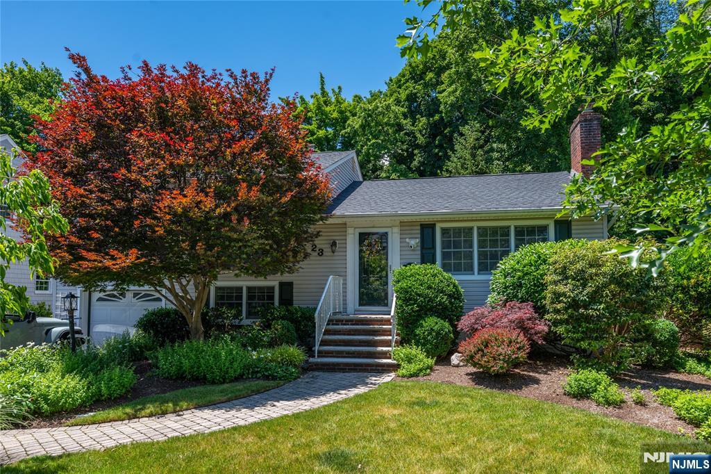 Set in one of Bergen County's most coveted communities â€” a town ranked #1 by both Niche and NJ Monthly Magazine â€” this beautifully maintained, move-in-ready Ho-Ho-Kus home delivers timeless charm, thoughtful updates, and an unbeatable location just steps from the train station, downtown, and exceptional restaurants. Inside, it's bright and airy with soaring ceilings, recessed lighting, updated bathrooms, and a warm, inviting living room centered around a cozy gas fireplace. The expansive family room addition is the heart of this home offering exceptional space for relaxing, entertaining, or gathering with family and friends. The primary bedroom offers two oversized closets for ample storage. The lower level family room opens up a whole extra layer of living space with a cozy recreation area with a convenient half bath. Step outside to your own private, picturesque retreat featuring a beautifully fenced backyard and an expansive deckâ€”perfect for entertaining or enjoying peaceful evenings outdoors. Enjoy the convenience of being one block to a charming downtown, just .6 miles to Ho-Ho-Kus K-8 school and a couple blocks to the NYC train.