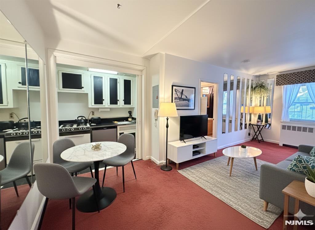 Come see this upgraded studio on the 3rd floor. Well maintained, hardwood floors under carpet. Steps to NYC transportation, Linwood Plaza shopping center, schools. Low maintenance including Spectrum cable. Parking permit is $13.00 per month for one car. Laundry facilities in building.
