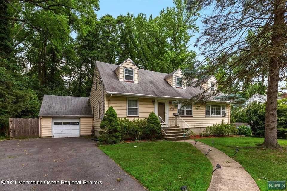 Fantastic opportunity to own in the well desired Packanack Lake community with optional membership! Well loved cape cod is ready for you with hardwood floors, bonus family room, attached garage expansive open basement, large deck off of dining room and plenty of space upstairs. Great commuter location - selling AS IS