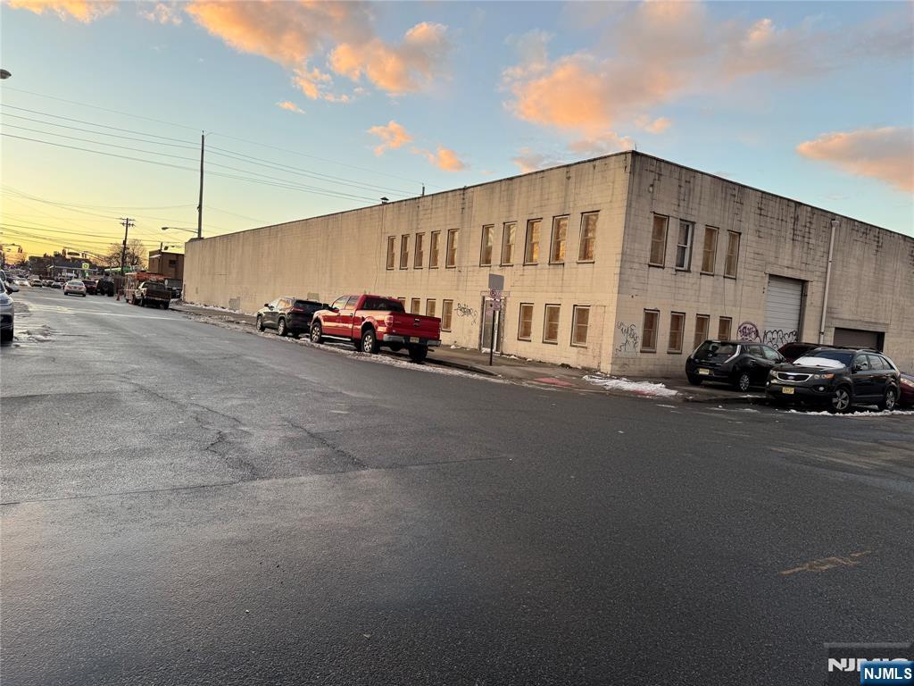 102,000 sq. ft. warehouse on 3.4 acres with approximately 60,000 square feet built in 1950 and 40,000 sq. ft. built around 1997. Each section has approximately 2500 sq. ft. office. Great location with easy access to Route 80, Route 46 and Route 21. Will be delivered vacant. Ceiling heating units. 1000 amps of power. Also available for lease at $17.00 per square ft. NNN