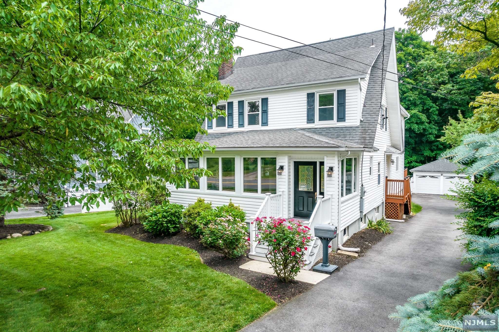 Welcome home to this newly renovated modern farmhouse in beautiful Glen Rock! This expansive home combines classic colonial features with updates throughout. At first glance you will see the landscaped yard with a new TREX deck front porch which leads inside to a full office with surrounding window views. Next you have a formal living room with wood burning stone fireplace which leads into the formal dining room perfect for hosting family gatherings. The pearl of the 1st level is the master kitchen with 9ft granite center island, Yorktowne cherry cabinetry, full updated modern bath, and open concept family room. Head upstairs to find 3 spacious bedrooms and another updated full bath. Grand finale is the master bedroom w/ 12ft ceilings, walk-in California closet, en-suite bath including rainfall shower and jacuzzi tub. Full finished basement boasts a redwood dry sauna, exercise room, and large family room with walkout. 2 car detached garage and a huge deck, this is the full package