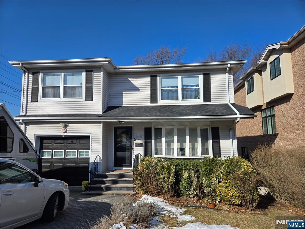 This spacious center hall Colonial, featuring four bedroomsâ€”each with a walk-in closetâ€”and four full baths (including a Jack and Jill bathroom), is perfect for large or extended families. The main level offers an expansive eat-in kitchen, while the ground floor includes a convenient summer kitchen with sliding glass doors leading to the backyard. Enjoy year-round comfort with a dual heating system and central air on both the first and second floors, complemented by hardwood floors throughout the main level.