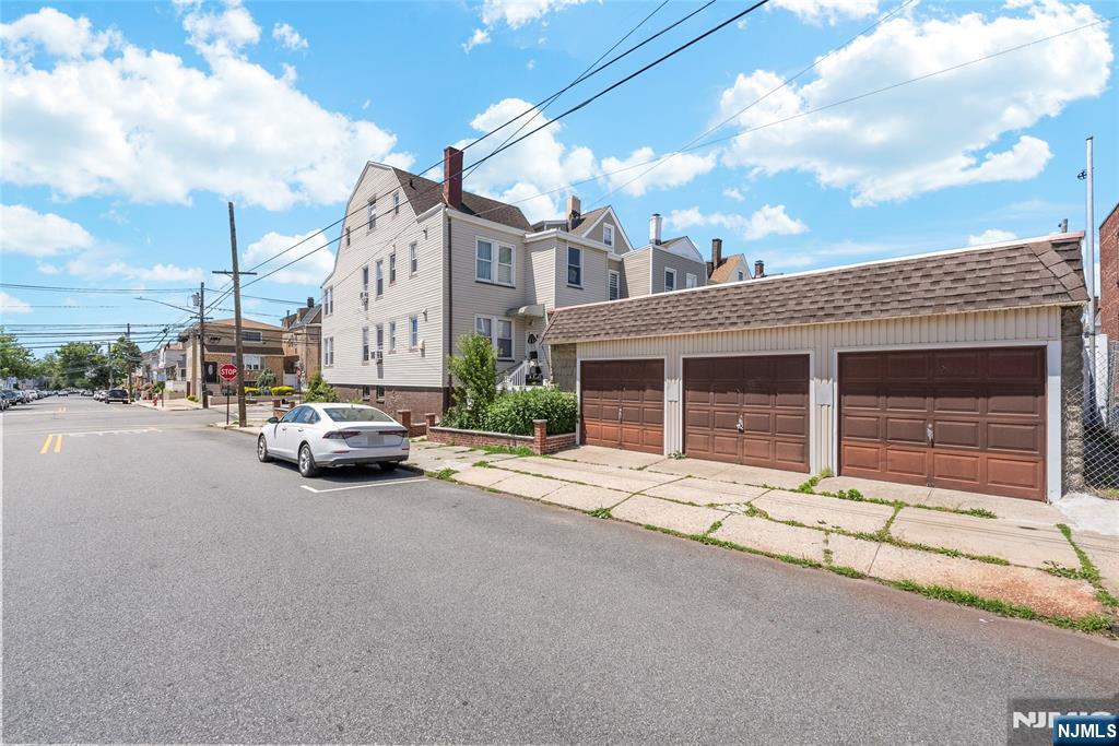 Incredible investment opportunity awaits in this spacious, well-maintained two-family home situated in a prime, high-demand commuter location less than ten miles from Manhattan. Perfect for savvy investors or buyers looking to house-hack, this turnkey property is fully occupied by tenants on flexible month-to-month leases, offering immediate cash flow from day one. Inside, you will find generous layouts with separate utilities for each unit, keeping landlord overhead to a minimum, along with a shared laundry area conveniently located in the basement. A standout feature of the property is the bonus attic space, which serves as a fantastic flex room for a home office, gym, or recreation area. Outside, the property boasts a rare, detached three-car garageâ€”providing massive added value for tenant parking, personal use, or extra rental income. Located just moments away from NYC transportation, major highways, local shopping, and dining, this versatile property combines location, space, and immediate return on investment.