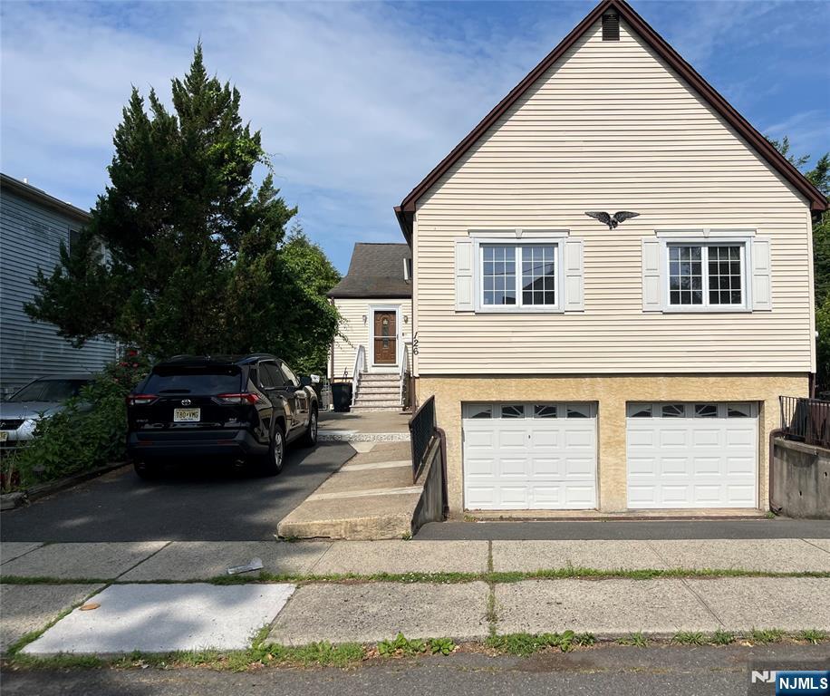 Beautiful Large Side by Side 2 Family Home located on quiet street close to stores, house of worship, schools & transportation. Meticulously maintained , 4 Bedrooms & 2 Full Baths. Spacious Loft style Bedroom on 2nd floor is very private with full bath. Perfect for Primary Bedroom! Large Kitchen with newer appliances. Hardwood floors & brand new Laminate flooring on 2nd floor and basement area. Finished Basement has Family room , Extra Bonus room can be used as a gym/ office area & Laundry area with newer Washer & Dryer. Lots of closet/storage space. Included is a one car Garage with Electric door opener and entrance to basement , & one Parking Space outside. It's like your own townhouse Credit Check & interview required