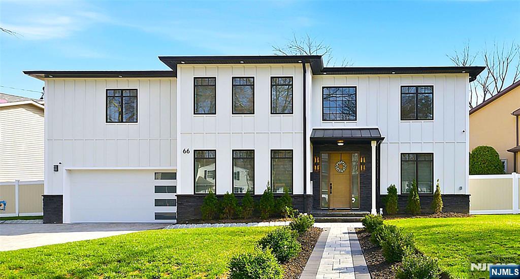Your search ends here!!! New Construction/New Foundation Home without the full price! Built in 2023, this young home gives you all the luxury features you need and all the peace of mind! Your new spacious home is beautifully designed with custom features and details throughout 5600 sf of total living space! Master carpentry displayed along with custom ceilings in every room. A grand double story foyer with 6' chandelier invites your guests with elegance and style. Walking throughout the white oak flooring, you will feel the real "at home" vibe of good energy and tons of natural light from your vast Andersen windows. Kitchen features high end built-in appliances and large island with waterfall edge. First floor guest ensuite for added convenience. Sliding glass doors lead you to the extended patio area for outdoor enjoyment! The second floor boasts 5 bedrooms, 3 full baths and laundry. Primary Suite is luxurious with huge walk in closet and spa-like bath w/soaker tub. Full finished basement with high ceilings is bright and sizeable for great recreation space. Gym or theatre room gives great flexibility and full bath available for additional guests. Custom blinds and complete closet systems make this home truly move in ready! A whole house generator included and double insulation for lower energy bills! Ideally situated on a quiet residential street, this home gives you easy access to major highways, public transportation, stores, restaurants, parks and more!