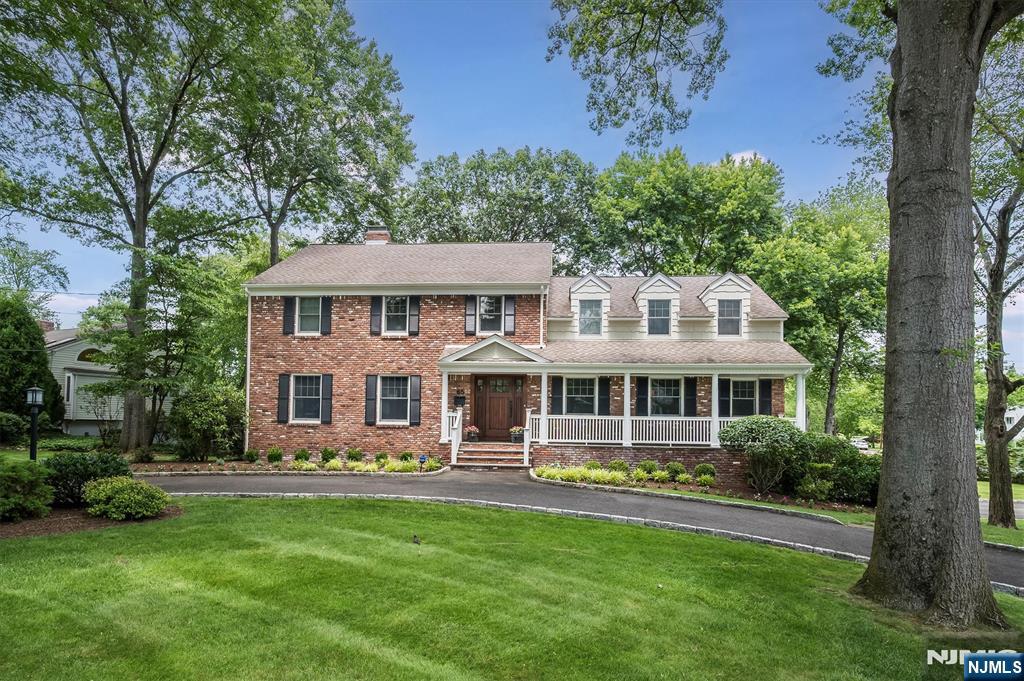 Dreams can come true in this expansive 5 BR,3.5 bth home ideally situated on a premier Gold Coast street in the desirable town of Glen Rock.Resort-style backyard is a private oasis featuring stunning heated pool,mature plantings providing exceptional privacy & charming pool house-perfect for summer entertaining & relaxation.Overlooking it all is a full-season sunrm illuminated by skylights,creating a serene space to enjoy year-round.A welcoming front porch draws you in to the entry foyer,flanked by a formal LR w/fpl & banquet-sized DR,both filled w/natural light.The large open-concept kitchen,offers a center island w/seating & an enormous custom pantry & a breakfast rm ideal for casual meals.This space flows seamlessly into the inviting FR w/beamed ceiling & striking brick fpl w/built-in cabinetry.A perfectly placed PR completes the 1st level.Upstairs,the primary suite serves as a private retreat w/vaulted ceilings,2 WICs & a well-appointed en-suite bth w/dbl sink vanity,jetted tub & separate shower w/built-in bench.4 addtl BRs provide flexible options for sleeping,working,or bonus spaces & are supported by an updated hall bth.Convenient hallway laundry completes the 2nd floor.Lower level offers generous finished spaces ideal for a rec rm,home gym,office/guest rm,along w/beautiful full bth.Walk-out pool storage rm,& direct access to oversized 2-car garage add to the homeâ€™s exceptional functionality.There are simply too many updates to list! Come experience it for yourself!
