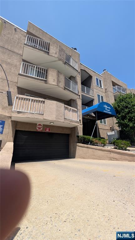 Location! Location ! Close to shopping , transportation. Unit all hardwood floor. Laundry in the unit. 2 Bedrooms with 2 full bathrooms. Livingroom with firplace and banclony . 2 cars parking in the garage.