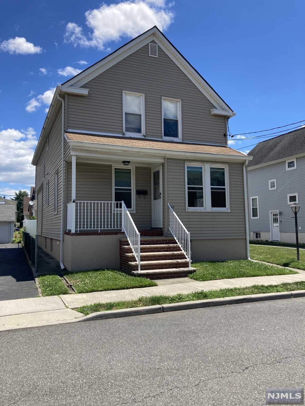 This is a rare 2 family find in Saddle Brook. 6 bedrooms/2 full baths. Unfinished basement. Large 2 car garage with 5+ car parking in driveway. New in 2009...Roof, siding, windows, garage, foundation, stairs, railings, screen doors. Close to NYC and many major highways such as Routes 80, 46, 17, 4 and the Garden State Parkway. NJ Transit Trains within walking distance, also a large parking lot at train deck.