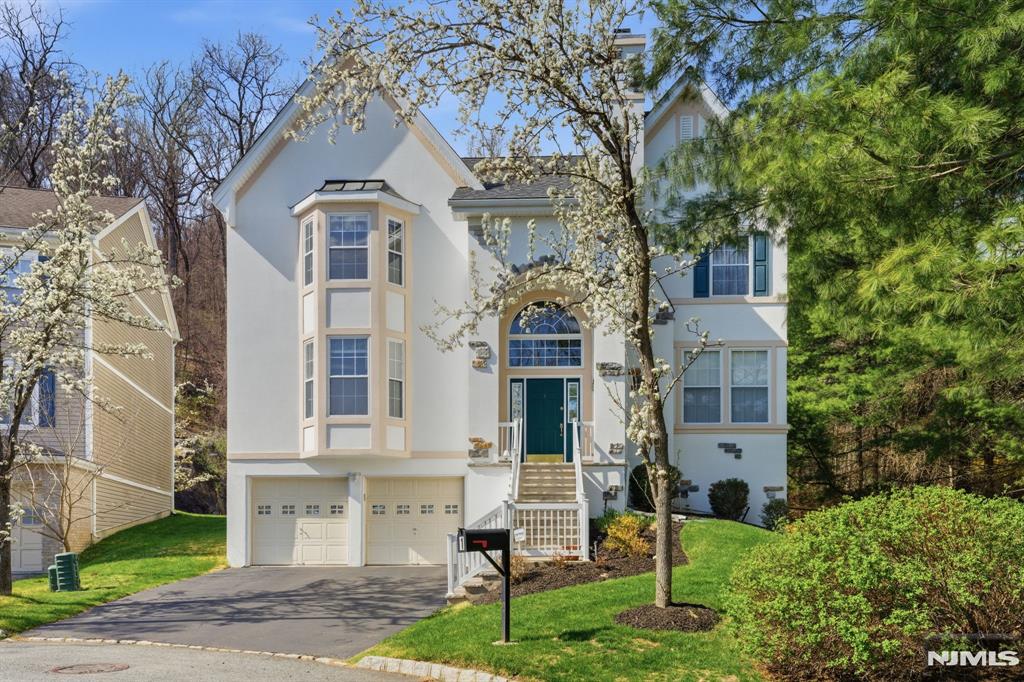 Set on a cul-de-sac in the desirable Ramapo River Reserve community in Oakland, this beautifully maintained 5-bedroom, 4 full bath, 1 half bath home offers generous space, comfort, and an exceptional setting. Filled with natural light, the home features updated interiors, two fireplaces, spacious gathering areas, and a floor plan designed for both entertaining and everyday living. Step outside to the rear deck and take in the peaceful natural surroundings. Bordering thousands of acres of preserved county and state land, the community provides convenient access to hiking and walking trails while remaining close to shopping, dining, recreational amenities, and major commuting routes. An exceptional opportunity to enjoy life in one of the premier neighborhoods in Oakland. For more information on this home please contact Robyn Louridas- 973-333-7522