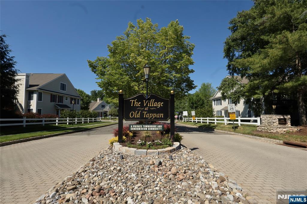 Welcome to 35 Quail Run, a beautifully maintained corner-unit Townhouse in The Village of Old Tappan. From the moment you enter, you will appreciate the bright, open layout and impressive cathedral ceilings that create a sense of space and elegance throughout the unit. The Sun-filled living room features gleaming hardwood floors, a fireplace and direct access to a private deck overlooking peaceful surroundings perfect for morning coffee or relaxing evenings. The main living level offers two spacious bedrooms and two full bathrooms, including a primary suite with its own private deck entrance, a closet and a Walk-in closet with a full bathroom with a tub and a shower. There is a Eat in Kitchen as well as a dining area which is open to the Living Room. The laundry is conveniently located on this main floor. This thoughtful floor plan makes everyday living effortless. The versatile third floor loft adds exceptional flexibility, complete with a full bathroom and two large closets. Whether you envision a guest suite, home office, recreation room, this space adapts to your lifestyle. Residents of The Village enjoy a quiet, well-maintained community with a swimming pool, clubhouse, scenic pond and walking paths. Conveniently located near top rated Old Tappan schools, shopping, dining, and parks. This home offers the perfect combination of comfort, convenience, and community. Don't miss this opportunity to add your personal style and modern touches to this spacious home. Sold As Is