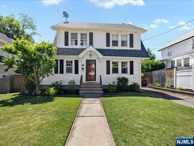 Welcome to 146 Kensington Ave, a charming home nestled on a quiet street in desirable Norwood, known for its excellent schools, friendly community feel, and low taxes. This inviting home offers a wonderful blend of comfort, convenience, and everyday livability. Step inside to a warm living room with hardwood floors, perfect for relaxing or gathering. The kitchen opens to the dining room, creating an easy flow for family dinners and entertaining. A convenient half bath completes the first floor. Upstairs features three bedrooms and a full bath with tub and skylight, plus a walk-up attic offering ample storage. The finished basement adds valuable living space with a den/play area, office, laundry, and workshop. Outside, enjoy a private backyard with a beautiful patio, ideal for morning coffee, summer barbecues, and outdoor enjoyment. Additional highlights include a roof and furnace only 5 years old. All this just 1 block to the NYC bus, a short walk to Norwoodâ€™s K-8 school, and approximately 2 miles to Closter Plaza with Whole Foods, HomeGoods, dining, and shopping. A wonderful opportunity in a sought-after community!