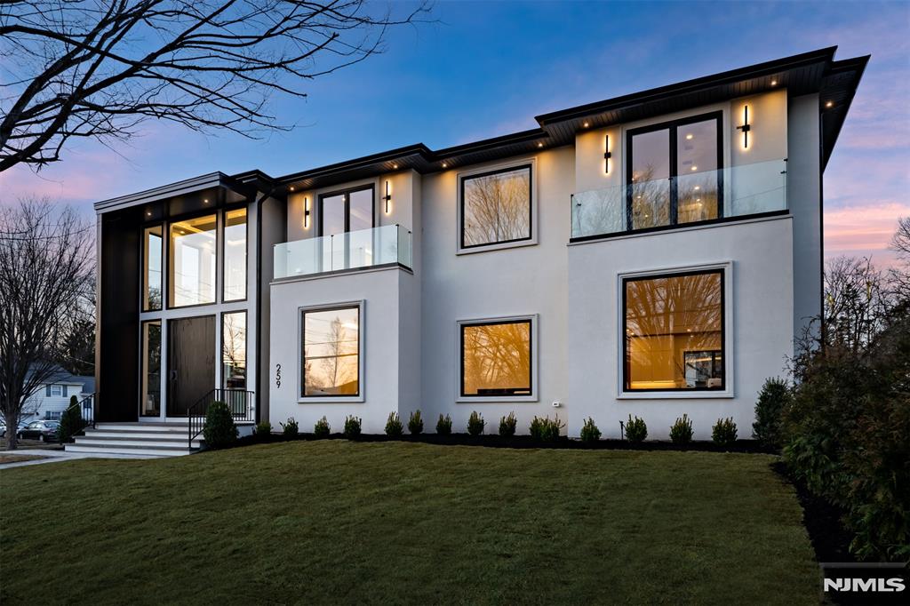 Gorgeous brand new construction modern masterpiece featuring 6 bedrooms, 6.5 bathrooms, & sleek LA-inspired architecture. A dramatic floating staircase with glass railings sets the tone for this luxurious new home. The open floor plan boasts a spacious great room with gas FP, large dining room, & a dream gourmet kitchen with Viking appliances, and stunning two tone warm wood and sleek white cabinetry. A first-floor bedroom with a full bath adds convenience. Upstairs, the primary suite impresses with 2 WICs & a spa-like en-suite with soaking tub, rainfall shower, double vanity & double vanity. Unique top floor entertaining space with wet bar. 2 junior sites each with WICs and en-suite baths. Upstairs laundry for your convenience. Entertainerâ€™s dream basement features a spacious rec room with wet bar, movie theater, and a 6th bedroom with a full bath. 2 car garage. Huge outdoor patio. So much more. Impeccable craftsmanship and high-end finishes throughout. Truly a gorgeous home.